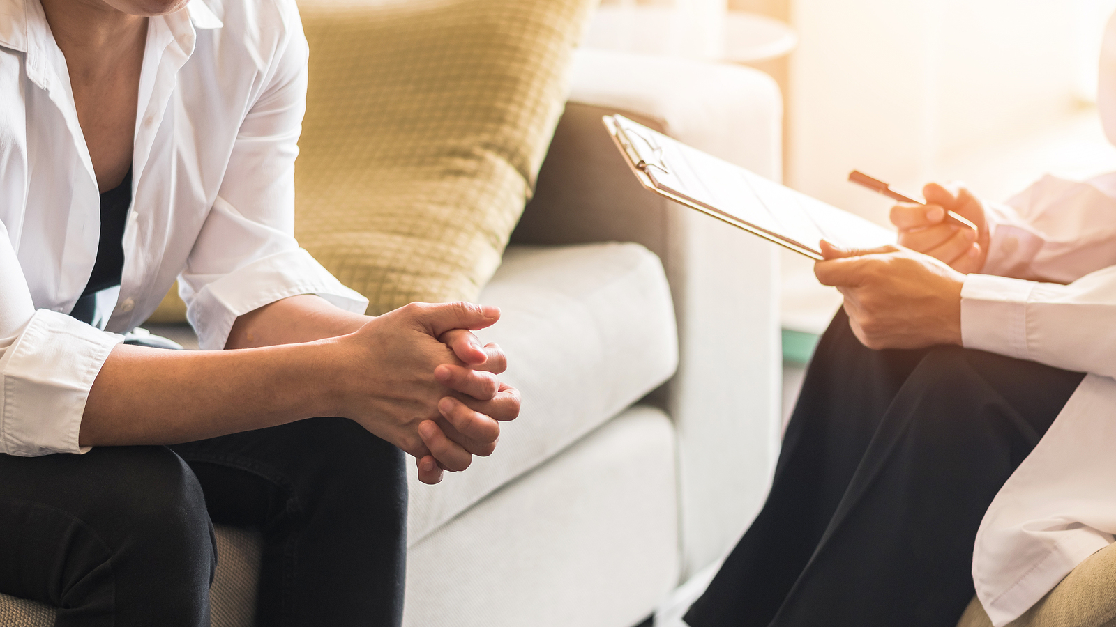 Doctor or psychiatrist consulting and diagnostic examining stressful woman patient on obstetric   gynecological female illness or mental health in medical clinic or hospital healthcare service center